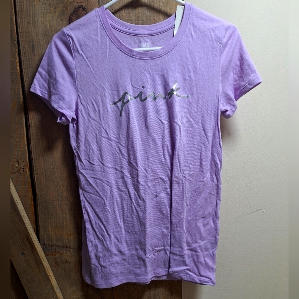 A Pink Victoria Secrets short sleeve purple t-shirt in a size X-Small. NWT.